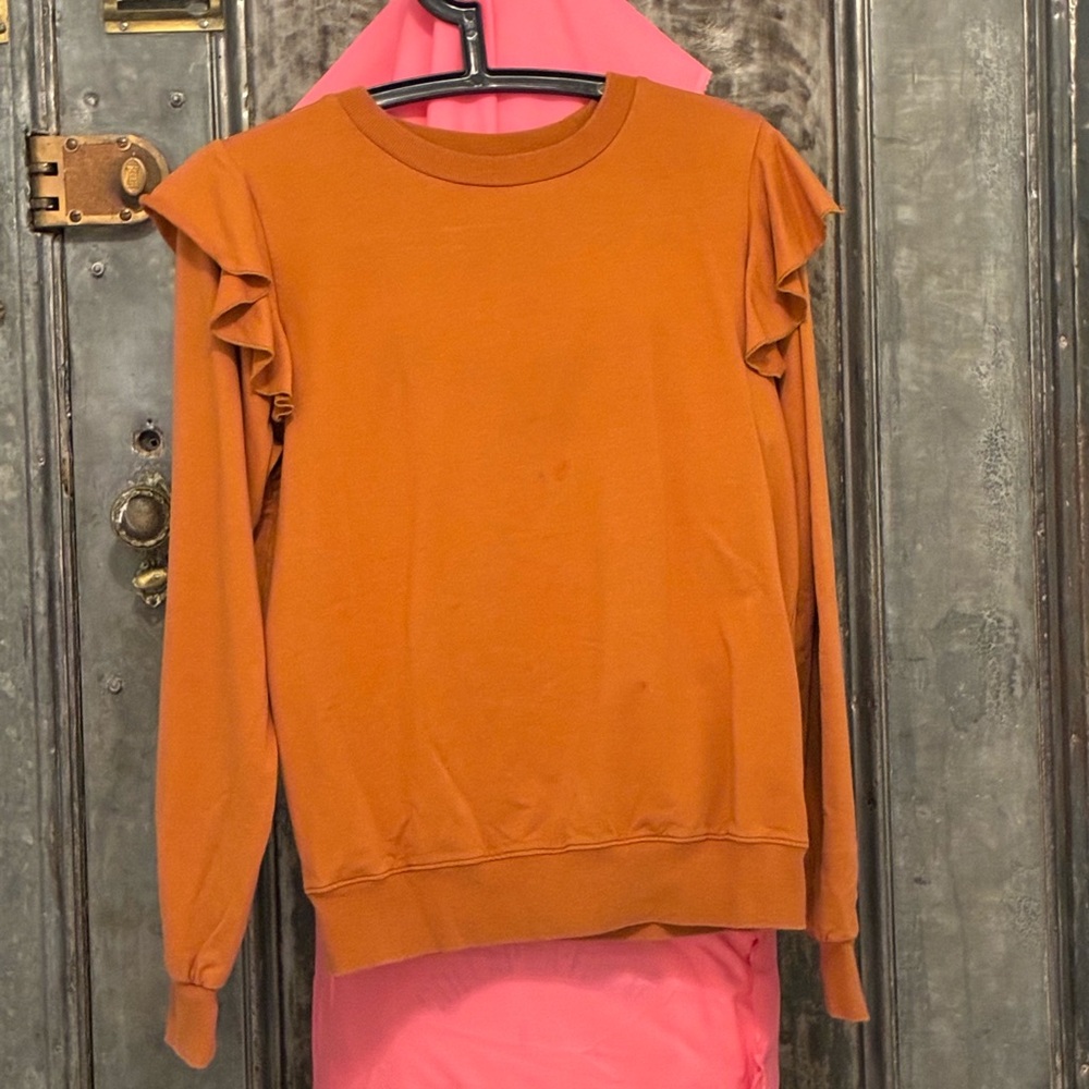 Small Rust Orange Ruffle Sweatshirt the drop